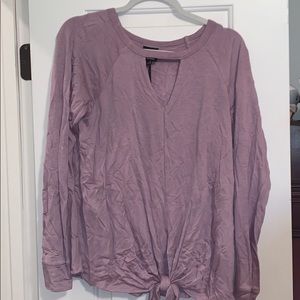 Light purple long sleeve shirt.